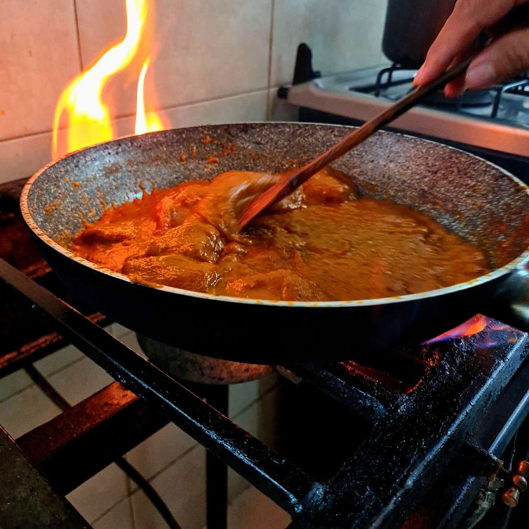 Chef cooking with flame